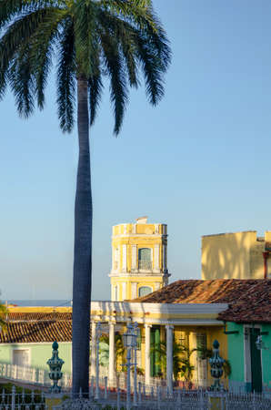 Yellow tower and blue houses taken in Trinidad Cubaの写真素材