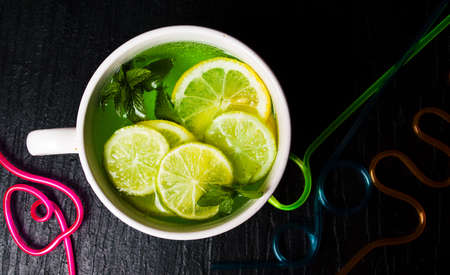 Mojito mint leaf cocktails with ice, summer refreshment