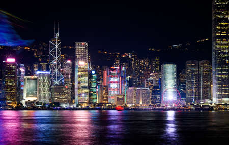 Hong Kong - August 7, 2018: Hong Kong cityscape view from the Victoria harbor at nightのeditorial素材