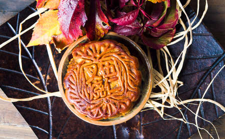 Chinese Mooncake with decorations on a table top view