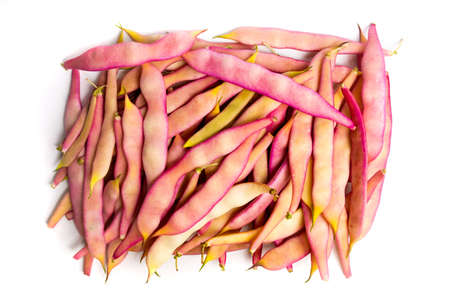 Purple beans on a pile, organic healthy food abstract