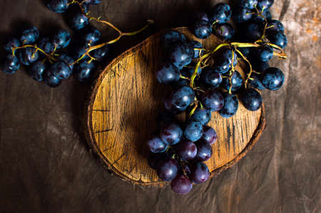 Fresh Grape on a rustic brown backgroundの写真素材