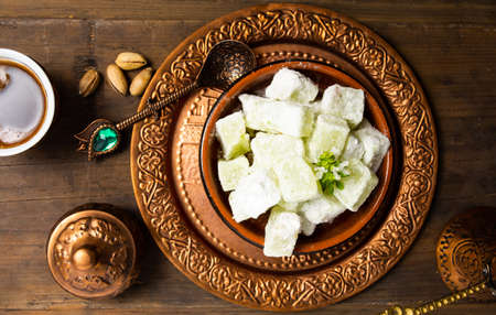 Turkish coffee and delight dessert with pistachio top viewの写真素材