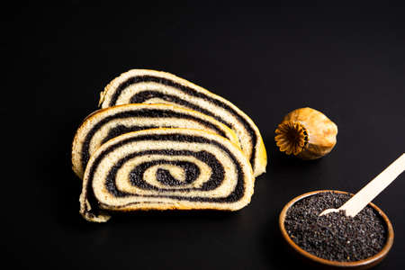 Poppy seed strudel dessert on dark backgroundの写真素材
