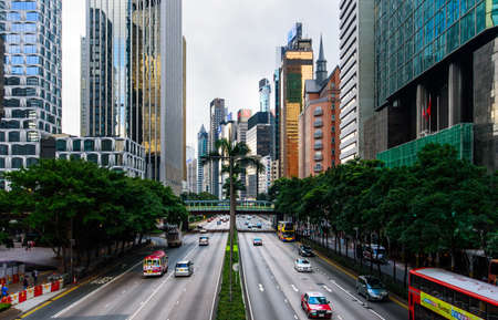 Hong Kong - August 9, 2018: Morning traffic in Hong Kong downtown area with modern buildings surroundingのeditorial素材