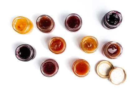 Various fruit marmalade jams in jars top viewhの写真素材