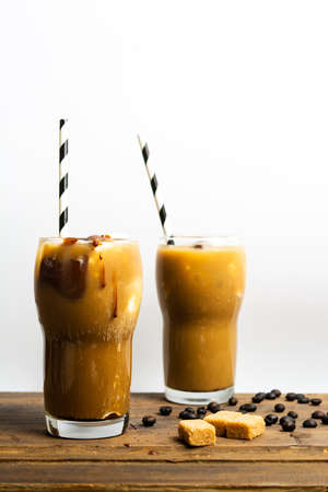 Mocha Coffee in a high drinking glass with a straw