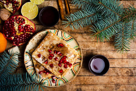 Homemade waffles pomegranate fruit on a plateの写真素材
