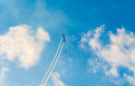 Jet planes making shapes in the sky during a showの写真素材