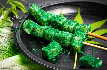 Marijuana cannabis leaves dessert snack on a stickの写真素材