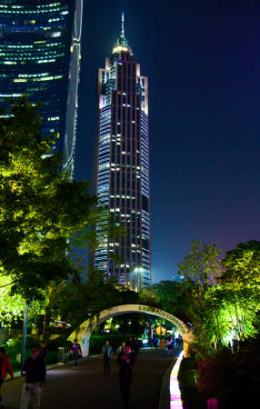 Guangzhou, China - January 3, 2018: Guangzhou Xiancun modern downtown area views of modern skyscrapers and tourists walking byのeditorial素材
