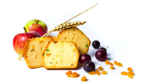Homemade fruit bread with raisins, grape and apple slicesの写真素材