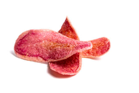 Red potato chips on a pile isolated