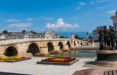 Skopje, Macedonia - August 26, 2017: Skopje Stone bridge over Vardar river near main square in Skopje, capital city of Macedoniaのeditorial素材