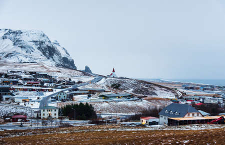 Vik landscape covered in snow, small town in Iceland