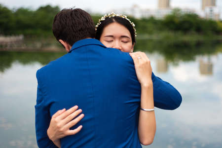 Loving couple hugging in the park close upの写真素材