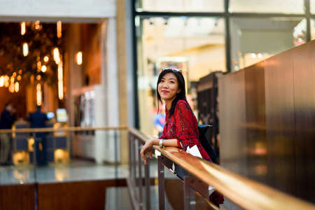 Fashionable Asian girl in the shopping mallの写真素材