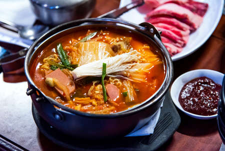 Korean spicy sausage stew with vegetables close upの写真素材