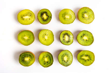 Kiwi fruits on white background top view