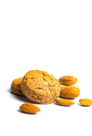 Integral cookies with almonds isolated on white backgroundの写真素材