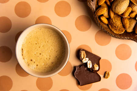 Cup of coffee on a table top viewの写真素材