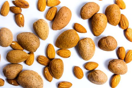 Fresh almonds isolated on white flat layの写真素材