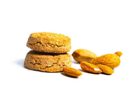 Integral cookies with almonds isolated on white backgroundの写真素材