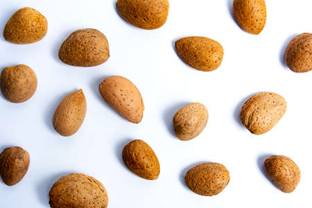 Fresh almonds isolated on white flat layの写真素材