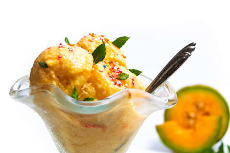 Sweet melon ice cream dessert on white isolated