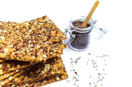 Biscuits with chia seeds and cereals isolated on white