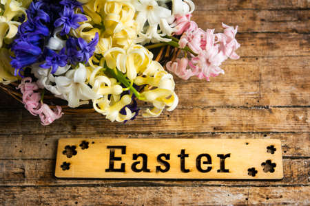 Eggs note card and colorful spring flowersの写真素材