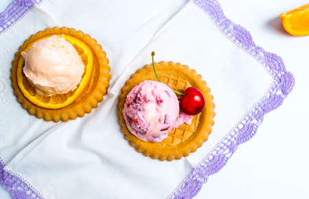 Cookie with ice cream and cherry fruit isolated