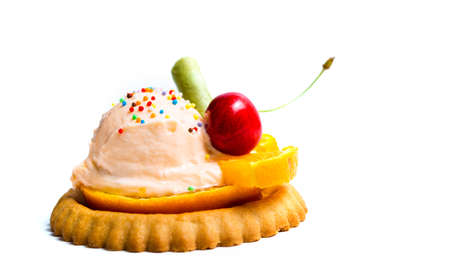 Cookie with ice cream and cherry fruit isolated