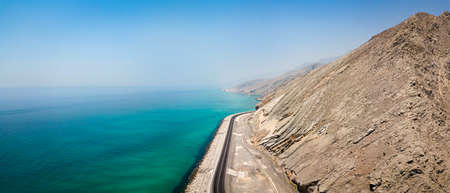 Coastal road and seaside in Oman aerial panoramic view