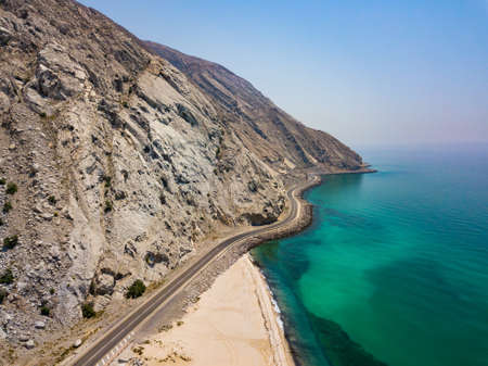 Coastal road and seaside in Musandam Governorate of Oman aerial view