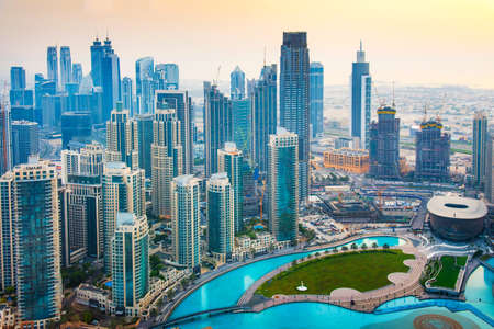 Photo pour Dubai, United Arab Emirates - July 5, 2019: Dubai downtown skyline and Burj Khalifa Lake top view at sunset - image libre de droit