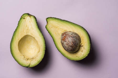 Freshly cut avocado on clean surface