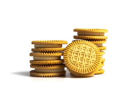 Golden biscuit sweet cookies isolated on whiteの写真素材