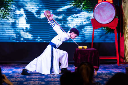 Chengdu, China - July 26, 2019: Artisan tea ceremony performance show at Chinese opera house in Chengdu, Sichuan province of Chinaのeditorial素材
