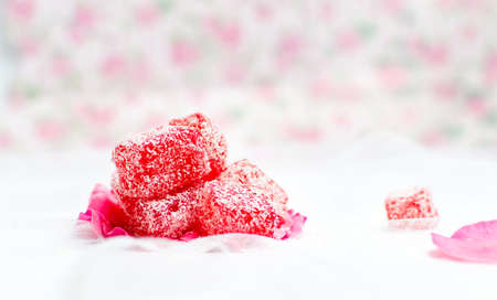 Turkish delight made of rose with coconut powder in a bowlの写真素材