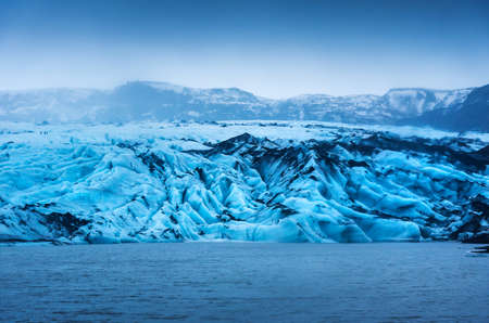 Solheimajokull Glacier landscape near Vik in south Iceland at duskの写真素材