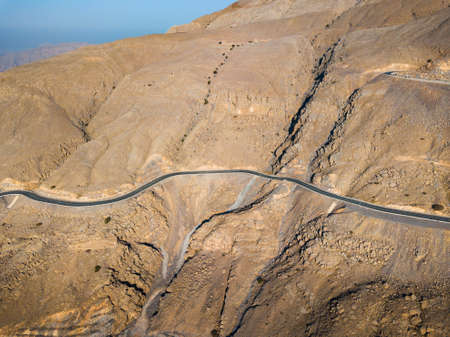Desert road on the Jebel Jais mountain in the UAE aerial viewの写真素材