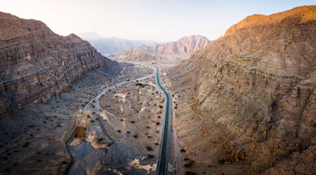 Scenic desert road on the Jebel Jais mountain in the UAE aerial viewの写真素材