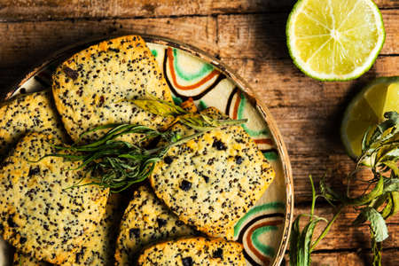 Cookies with marijuana and chia seeds on a wooden tableの写真素材