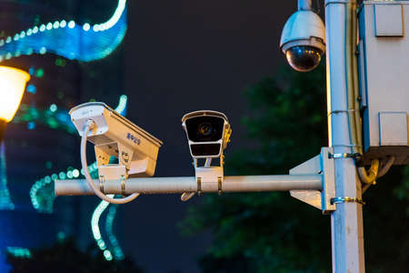 Chongqing, China - July 22, 2019: Surveillance CCTV camera on the street a common view in Chongqing, the city with the largest number of cameras in Chinaのeditorial素材