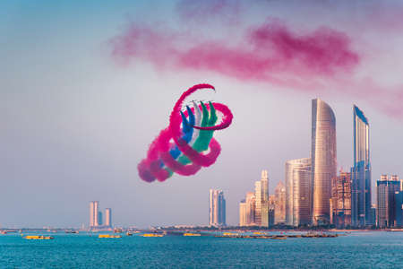 Air show over Abu Dhabi skyline for the United Arab Emirates national day celebration