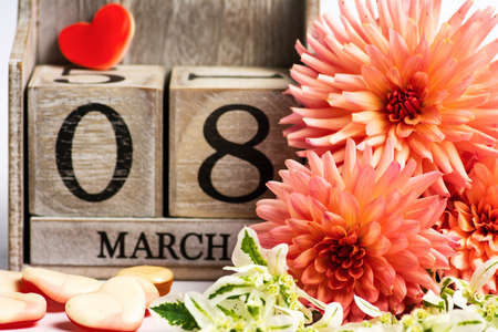 International Women's Day date card reminder with dahlia flowersの写真素材