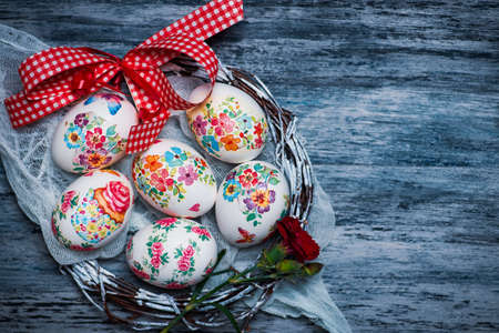 Decoupage decorated Easter eggs with flower pattern for a happy holidayの写真素材