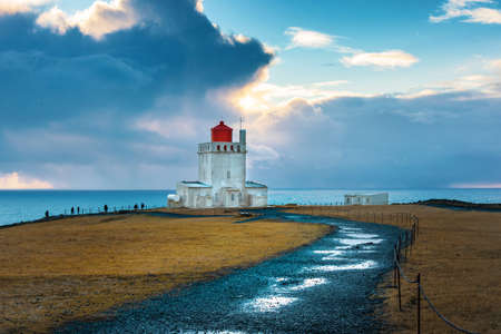 Dyrholaey lighthouse new Vik in Iceland with a scenic view over the coastの写真素材