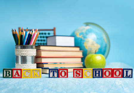 Alphabet and education abstract in front of the blackboard closeupの写真素材